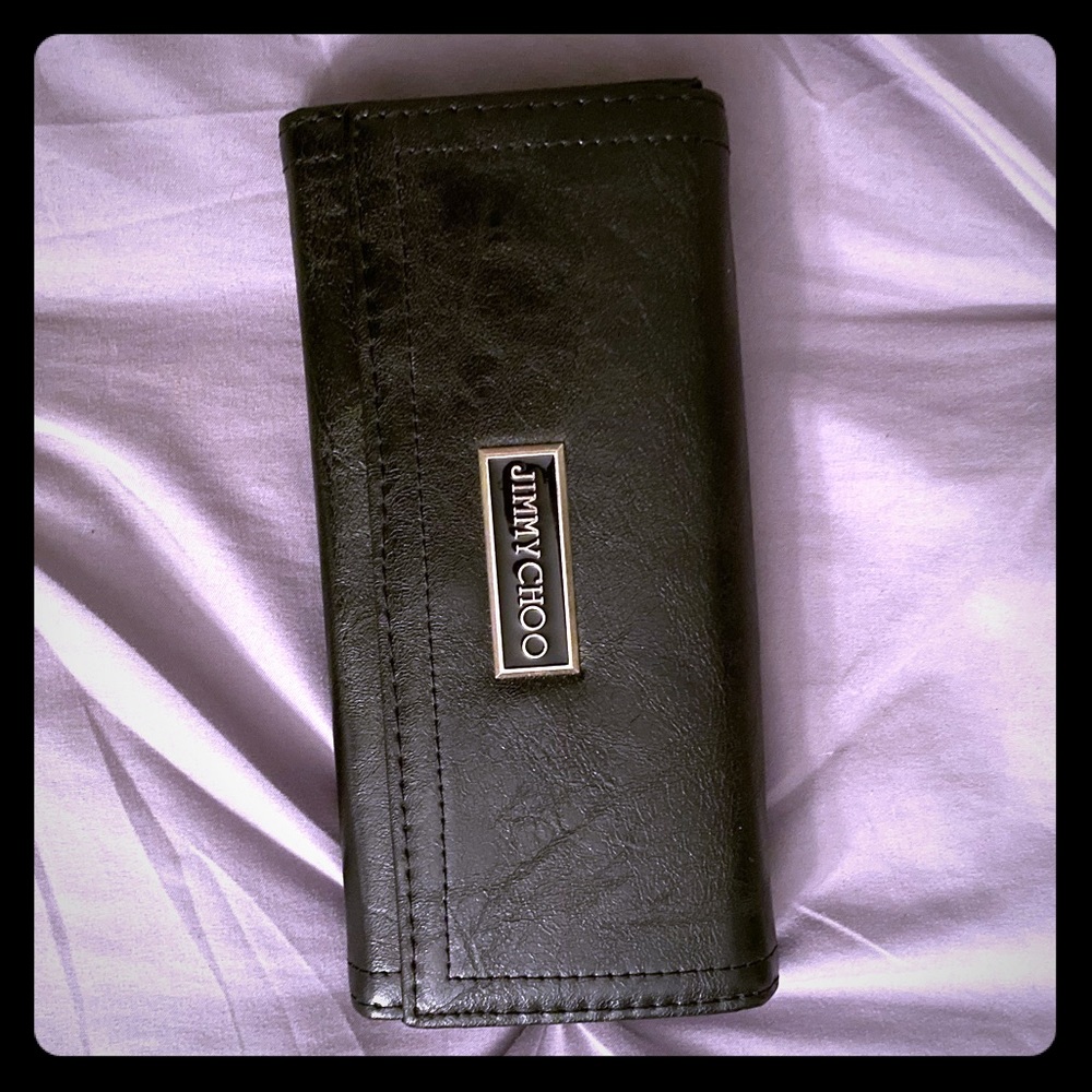 BRAND NEW Jimmy Choo black leather wallet.